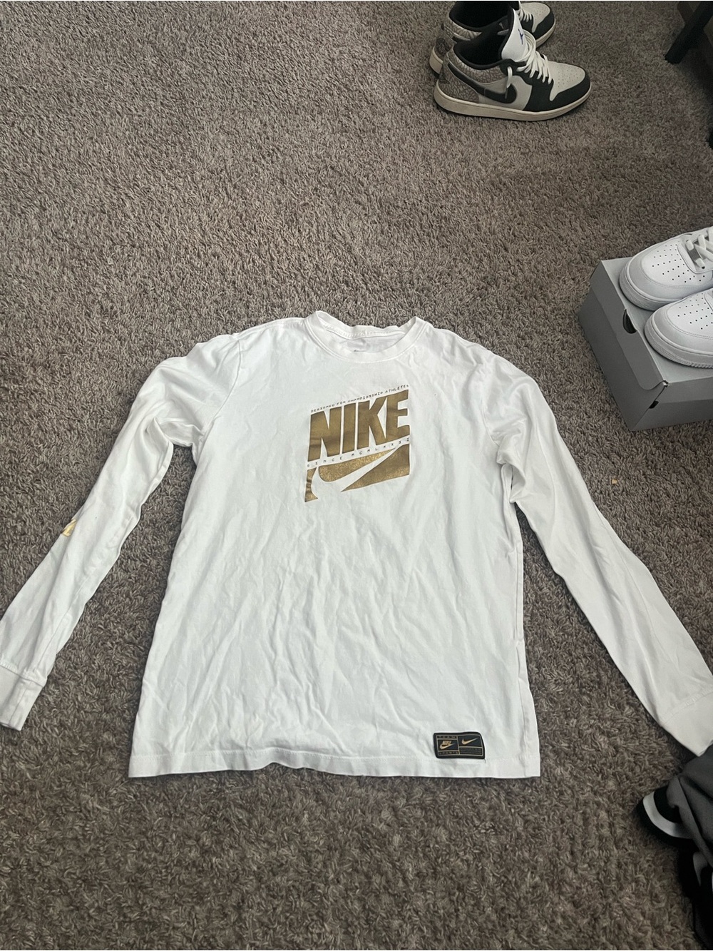 Nike White Long-Sleeve Tee with Gold Logo
